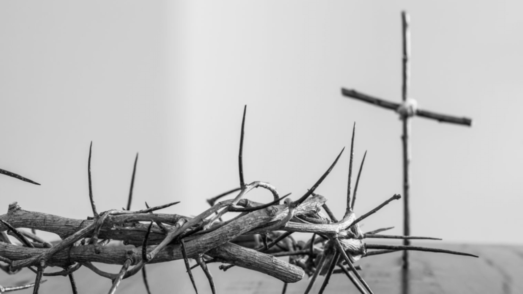 A cross and crown of thorns.