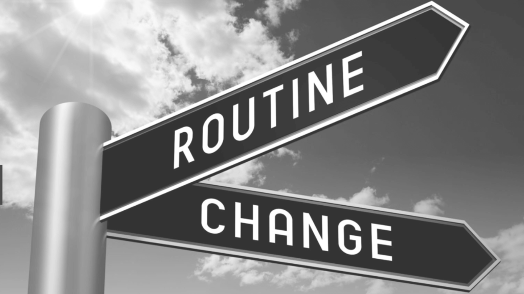 Road signs that point to "Routine" and "Change".