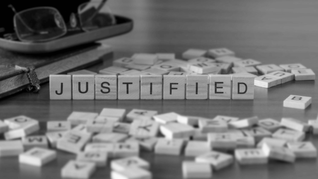 Justified spelled out in Scrabble Letters